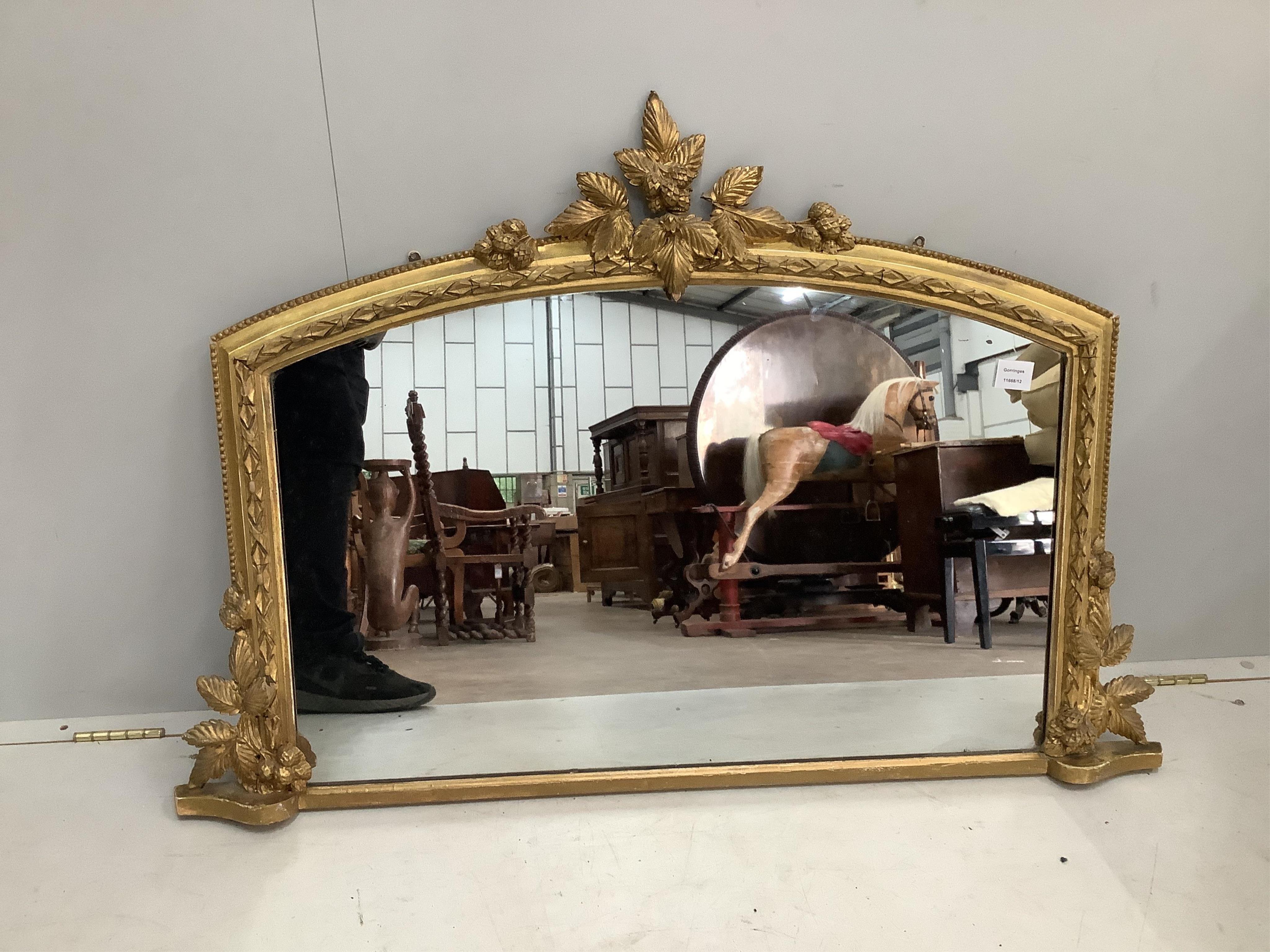 A Victorian gilt framed overmantel mirror, width 116cm, height 79cm. Condition - fair